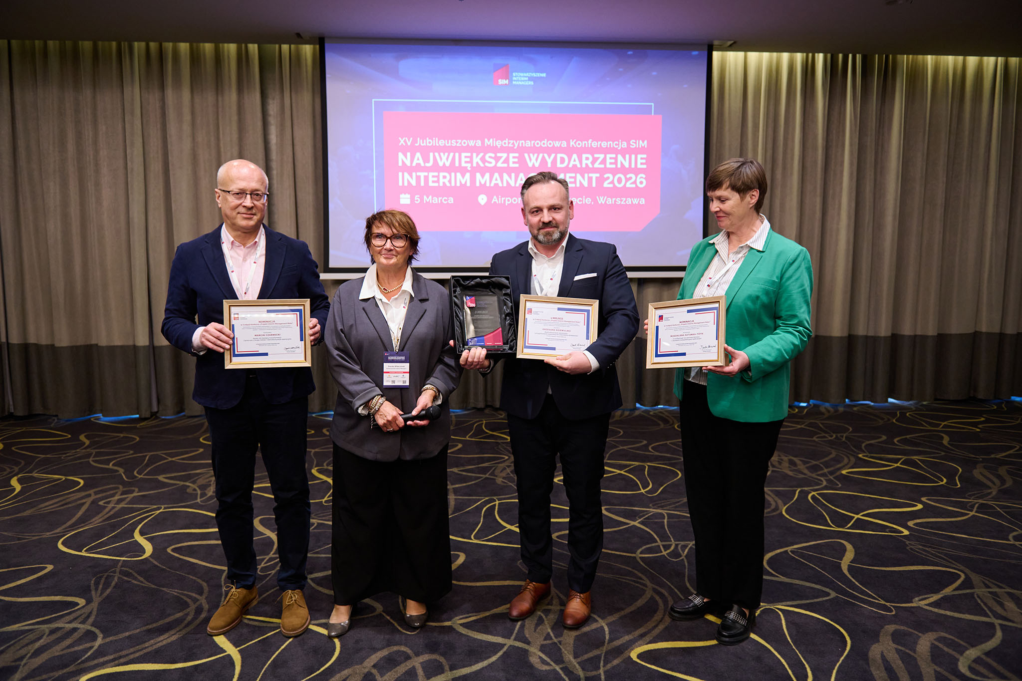 Laureaci wraz z Prezes SIM